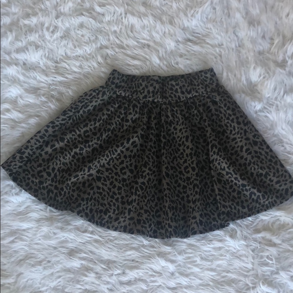Grey/black cheetah print skirt.
